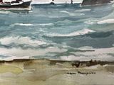 two boats that are sitting in the water on the beach