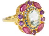 une image représentant une bague en or sertie d'un améthyste vert entouré de saphirs roses et de saphirs bleus