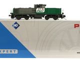 la boîte d'un train miniature est posée sur une surface blanche
