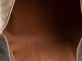 the inside of a louis vuitton bag with a zipper