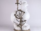 an image of a candle holder with a rooster on it