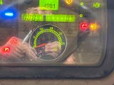 a close up of a car dashboard with a speedometer