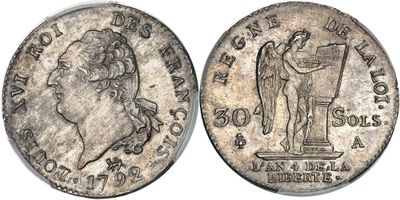 une pièce d'argent sur laquelle figure l'image d'un homme tenant un drapeau
