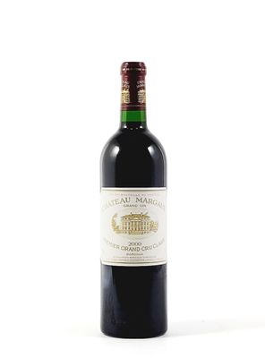 a bottle of wine that is sitting on a table