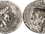 a silver coin with an image of a man on it