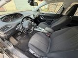 the interior of a small car with a steering wheel and dashboard