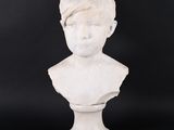 a white marble bust of a young boy with a turban on his head