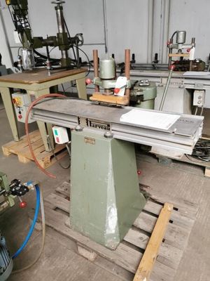 a picture of a machine that is working on a piece of wood