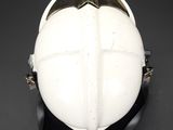 an image of a white helmet on a black stand