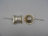 a pair of antique silver flower hair pins