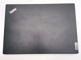 a black laptop with a sticker on it