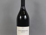 a bottle of wine that is sitting on a table
