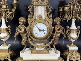 a clock that is sitting on top of a table