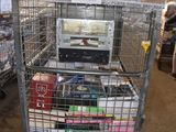 a shopping cart with a laptop on it in a store