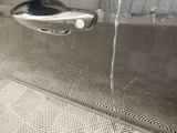 a close up of a door handle on a car
