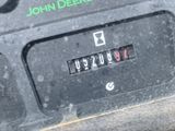 a close up of a car ' s dashboard with a clock on it