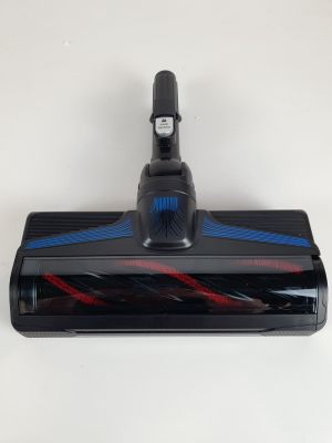 a close up of a vacuum cleaner on a white surface
