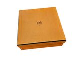 a brown box with a black lid on a white background