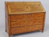 a wooden desk with drawers and drawers on top of it