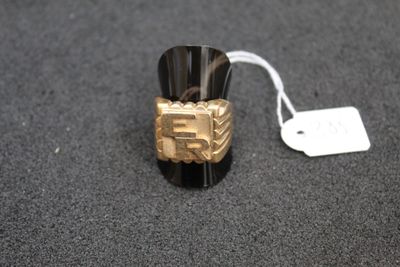 a ring that has a tag attached to it