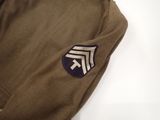 a close up of a jacket with a badge on it