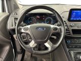 the interior of a car with a steering wheel and dashboard controls