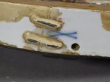 a close up of a piece of furniture with paint on it