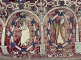 a red and blue rug with pictures of people on it