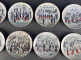 six plates with a picture of a group of people on them