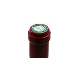 a bottle of wine that is sitting on a table