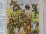 an open book with a picture of a woman feeding chickens