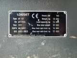 a metal sign on the side of a metal wall