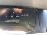 dashboard of a car with a digital display on the dash