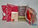 many bags of food that are sitting on a table