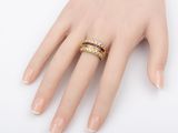 an image of a woman ' s hand with a ring on it ' s finger