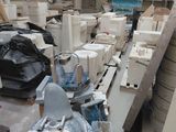 a room with a lot of boxes and a machine in it
