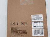 the back of a brown box with a white sticker on it