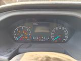 a close up of a car dashboard with a speedometer