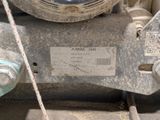 a close up of a machine that is sitting on the ground