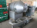 a machine that is sitting on a cart in a warehouse