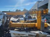 a crane that is sitting on the back of a truck