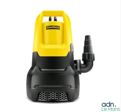 un aspirateur jaune et noir muni d'un tuyau