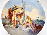 une assiette sur laquelle est représenté un homme et une femme