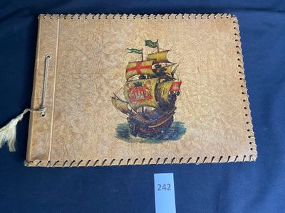 a picture of a book with a picture of a ship on it