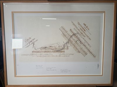 a drawing of a train on display in a frame