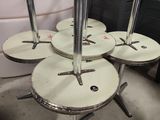 four stools that are stacked on top of each other