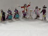 many figurines that are arranged in a circle