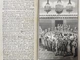 an open book with a picture of a large group of people sitting at a table