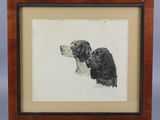 painting of a dog and a cat in a frame on a table