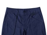 a close up of a pair of blue shorts on a white background